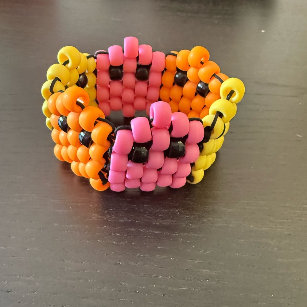 Handmade custom pack man Kandi cuff bracelet